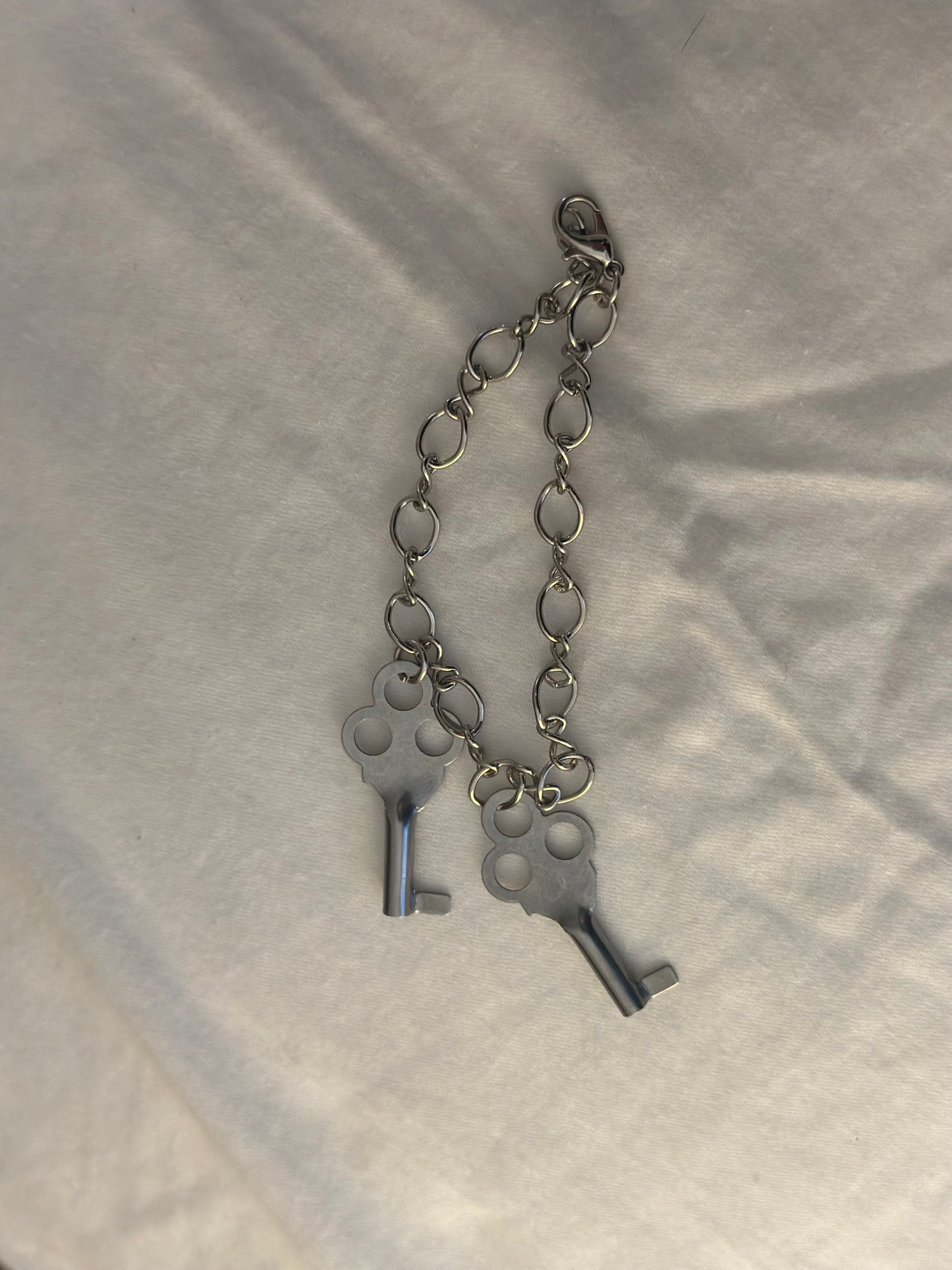 Handcuff keys bracelet
